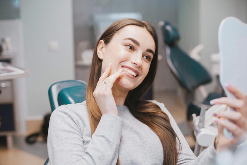 girl smiles in dentistry